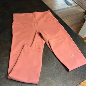 Pink Lululemon leggings.